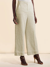 Elegantes pantalones anchos de tweed con bolsillos